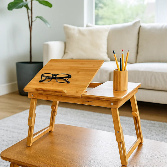 Folding bamboo laptop table with adjustable tilt top, drawer, and legs for use in bed or on sofa