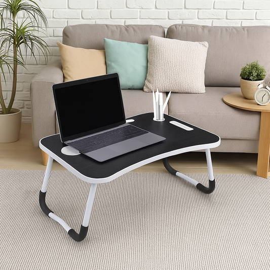 Black folding laptop desk with cup holder and device slot, perfect for bed, sofa, or portable use