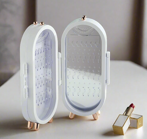 White jewelry box with rose gold accents on a light surface