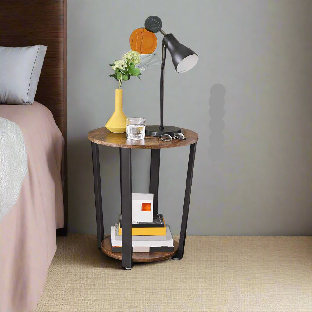 Round rustic side table with steel frame in black and brown for living room or bedroom