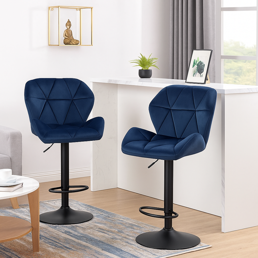 Two navy blue bar stools with black bases in a home office setting.