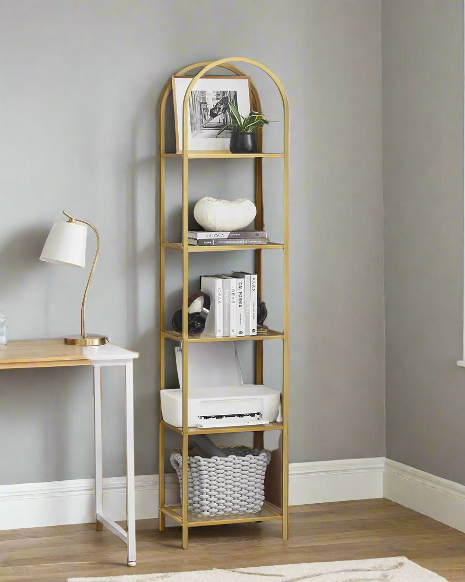 5-tier metallic gold arched glass shelving unit with transparent shelves in a modern living room