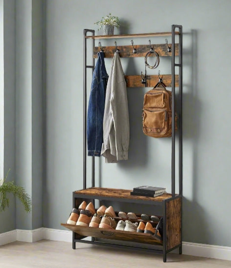 Rustic brown and black industrial hall tree with bench, coat hooks, top shelf, and flip-door shoe storage