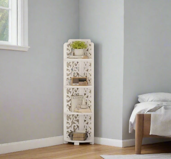White 4-tier free-standing corner shelf in a bathroom holding toiletries and plants