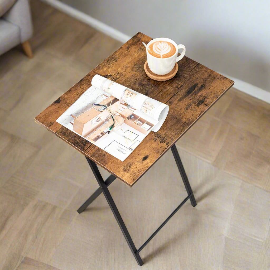 Rustic brown industrial folding side table with black metal frame, ideal for sofa snacks, TV dinners, or small-space living