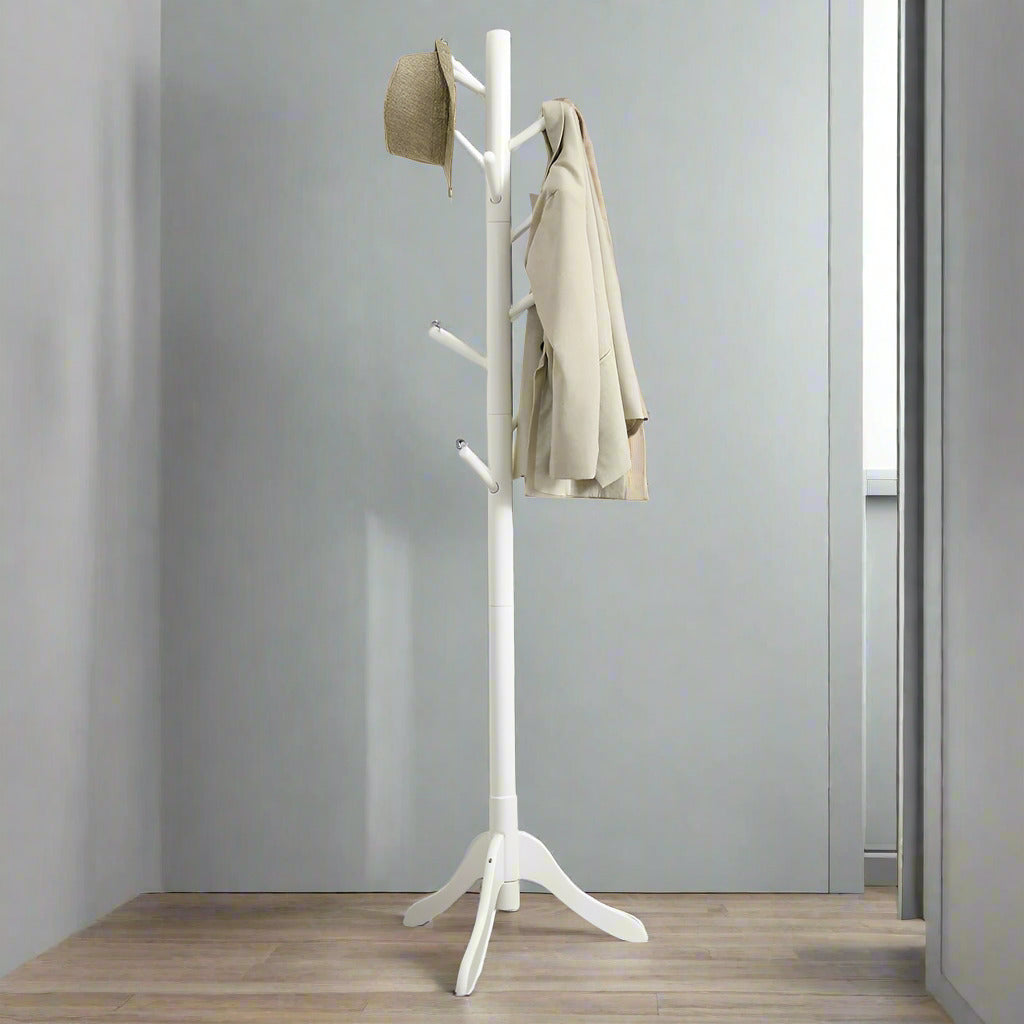 White freestanding coat rack with 8 hooks and tri-legged rubberwood base, ideal for entryways and hallways