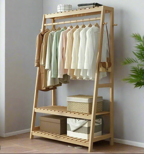 Garment stand with shoe storage shelves and ladder rails

