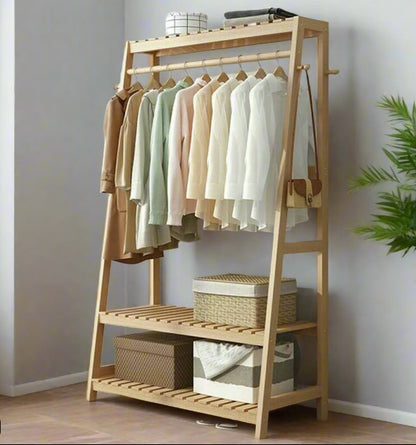 Garment stand with shoe storage shelves and ladder rails

