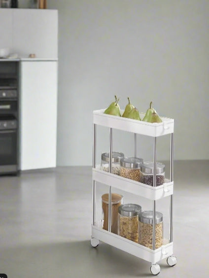 Slim white 3-tier rolling storage trolley with wheels and hooks, ideal for tight spaces in kitchens or bathrooms

