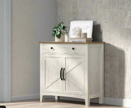 Rustic farmhouse sideboard in white and honey brown with drawer and barn doors in a living room

