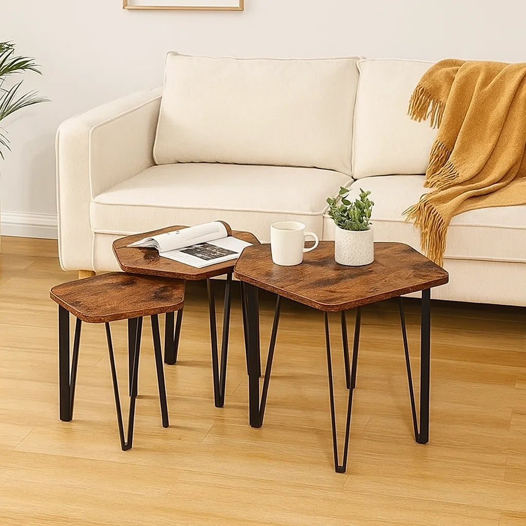 Set of 3 rustic brown nesting coffee tables with black steel frames

