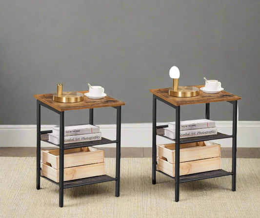Set of two rustic brown and black side tables with adjustable mesh shelves in industrial style