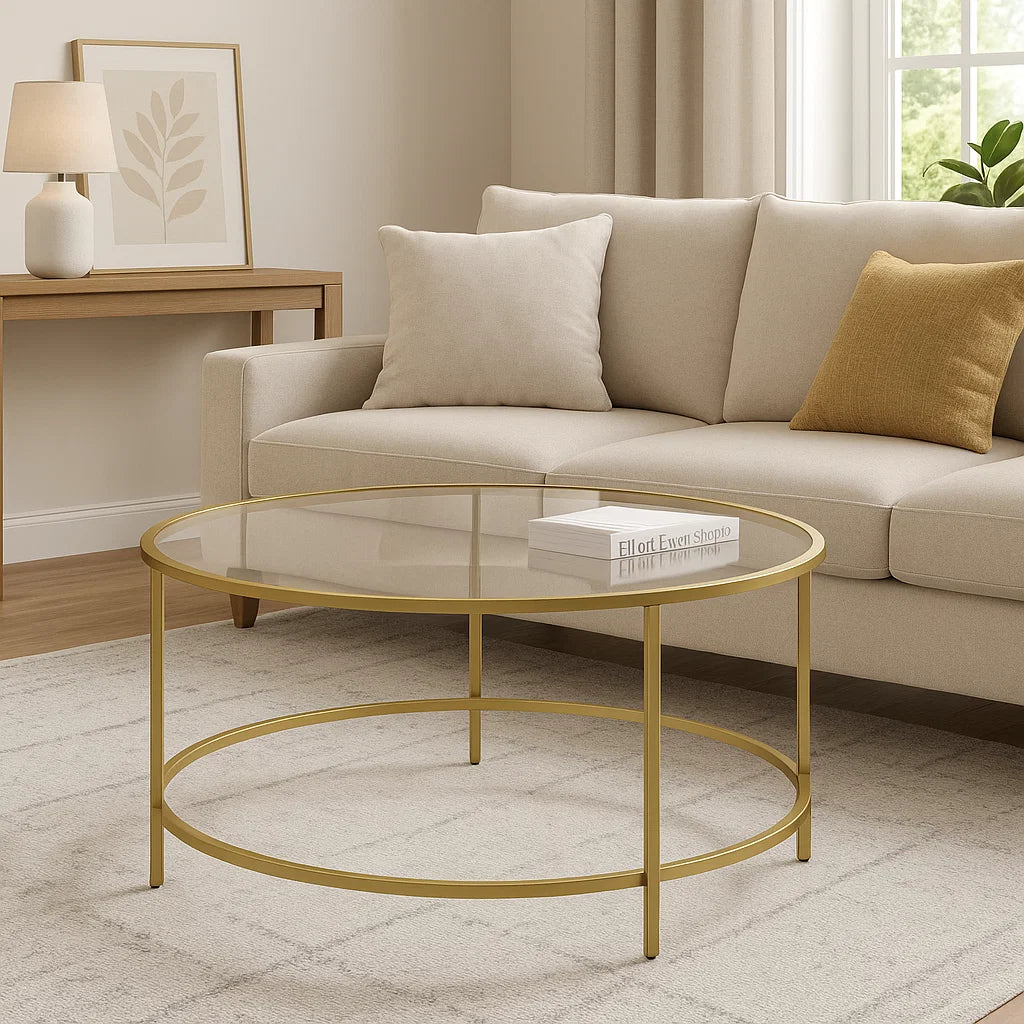 Modern round glass coffee table with gold metal frame for living room

