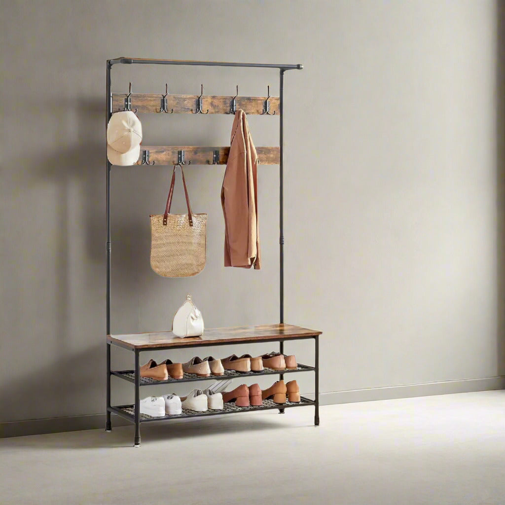 "Oak-white industrial-style coat rack with bench, hanging rail, and dual steel mesh shelves for shoes—ideal for hallways and bedrooms."

